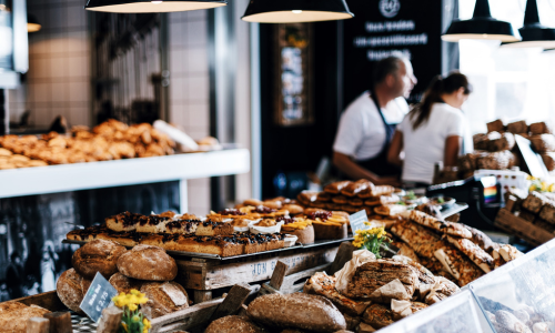 a bakery filled with lots of different types of pastries